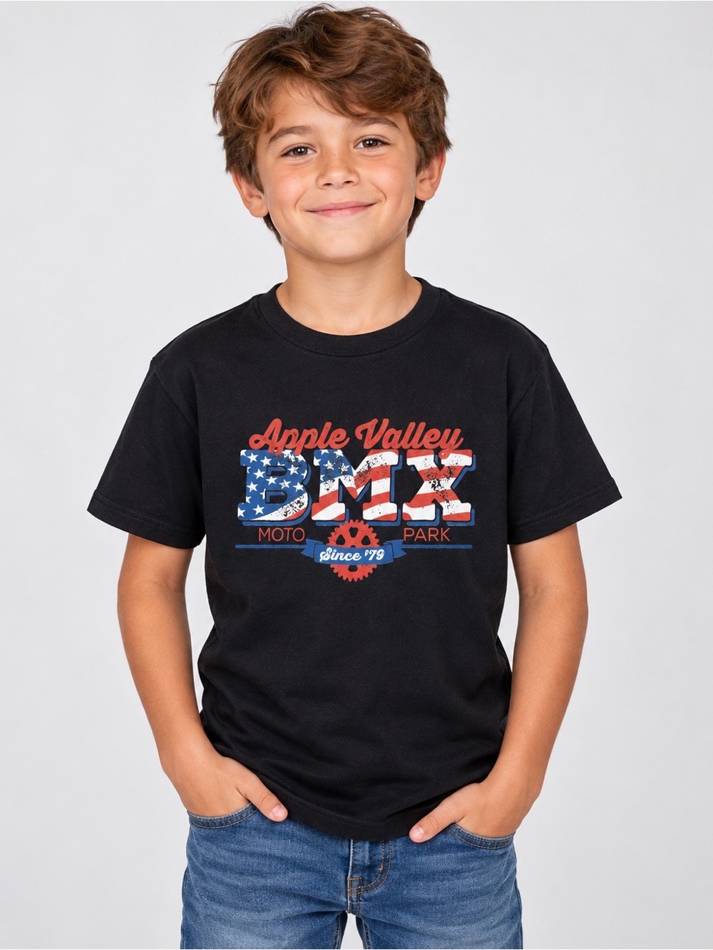 Cool boys’ black short-sleeve T-shirt featuring an Apple Valley BMX Moto Park